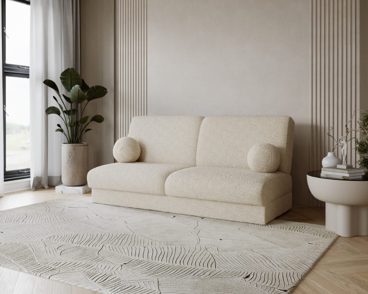 Sofa z tkaniny bukla LUMENA w salonie w stylu japandi i minimalistycznym.